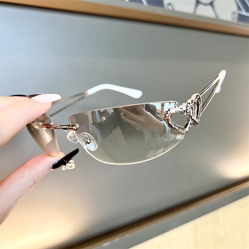 新しいオーバルキャットアイフレームレスマーキュリーサングラス - Vintage Fashion Glasses のレビューと価格