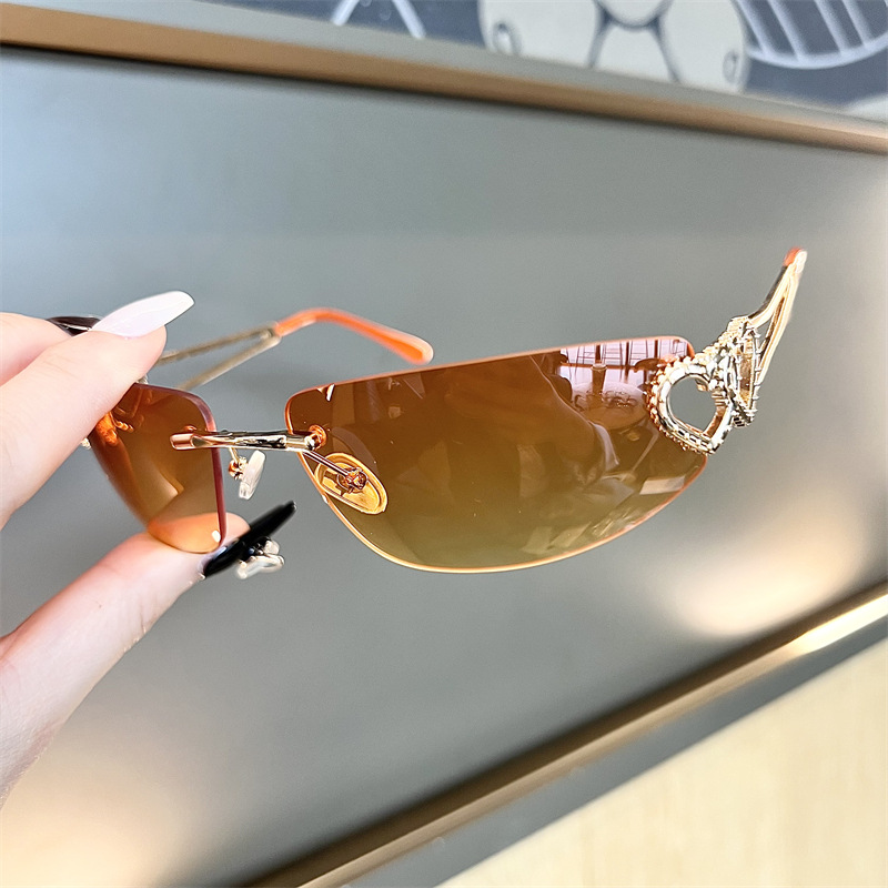 新しいオーバルキャットアイフレームレスマーキュリーサングラス - Vintage Fashion Glasses のレビューと価格